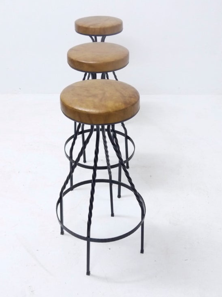 Footswith e.g. wrought iron feet and 60s vinyl seating