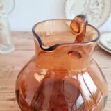 Antique amber glass pitcher
