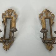 Pair of wall sconces in carved wood and silvered and gilded patinated metal with a central mirror.