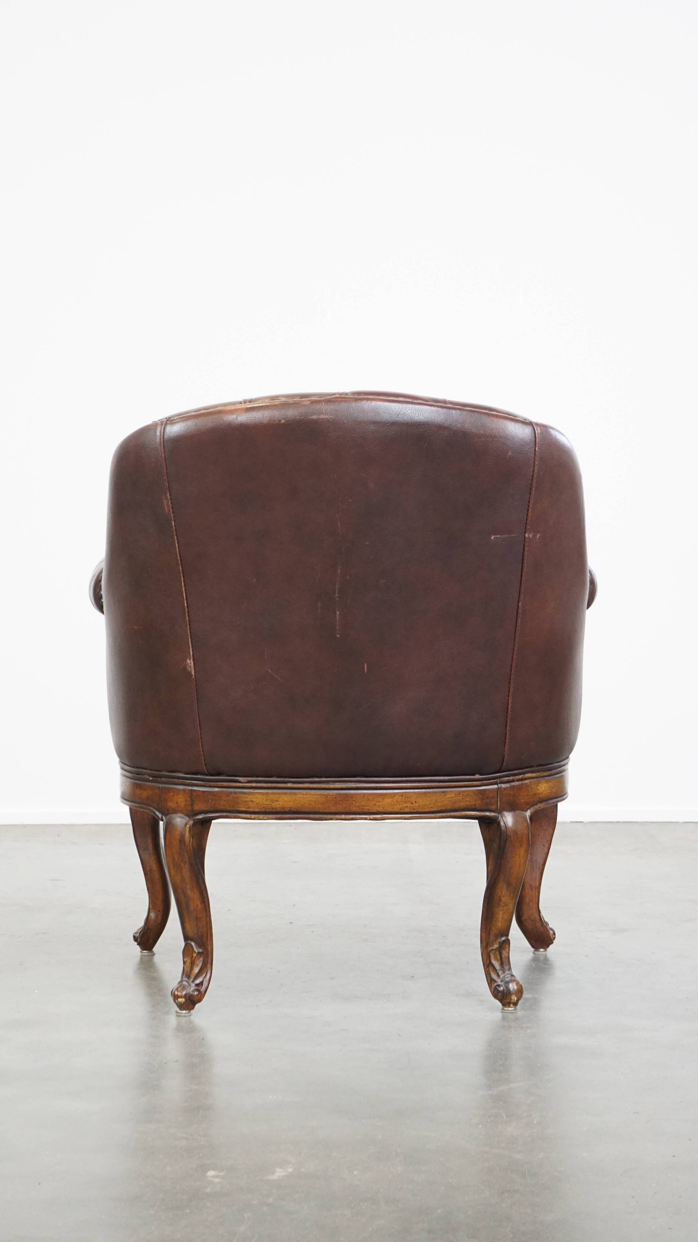 Fauteuil chesterfield anglais classique en cuir de vachette