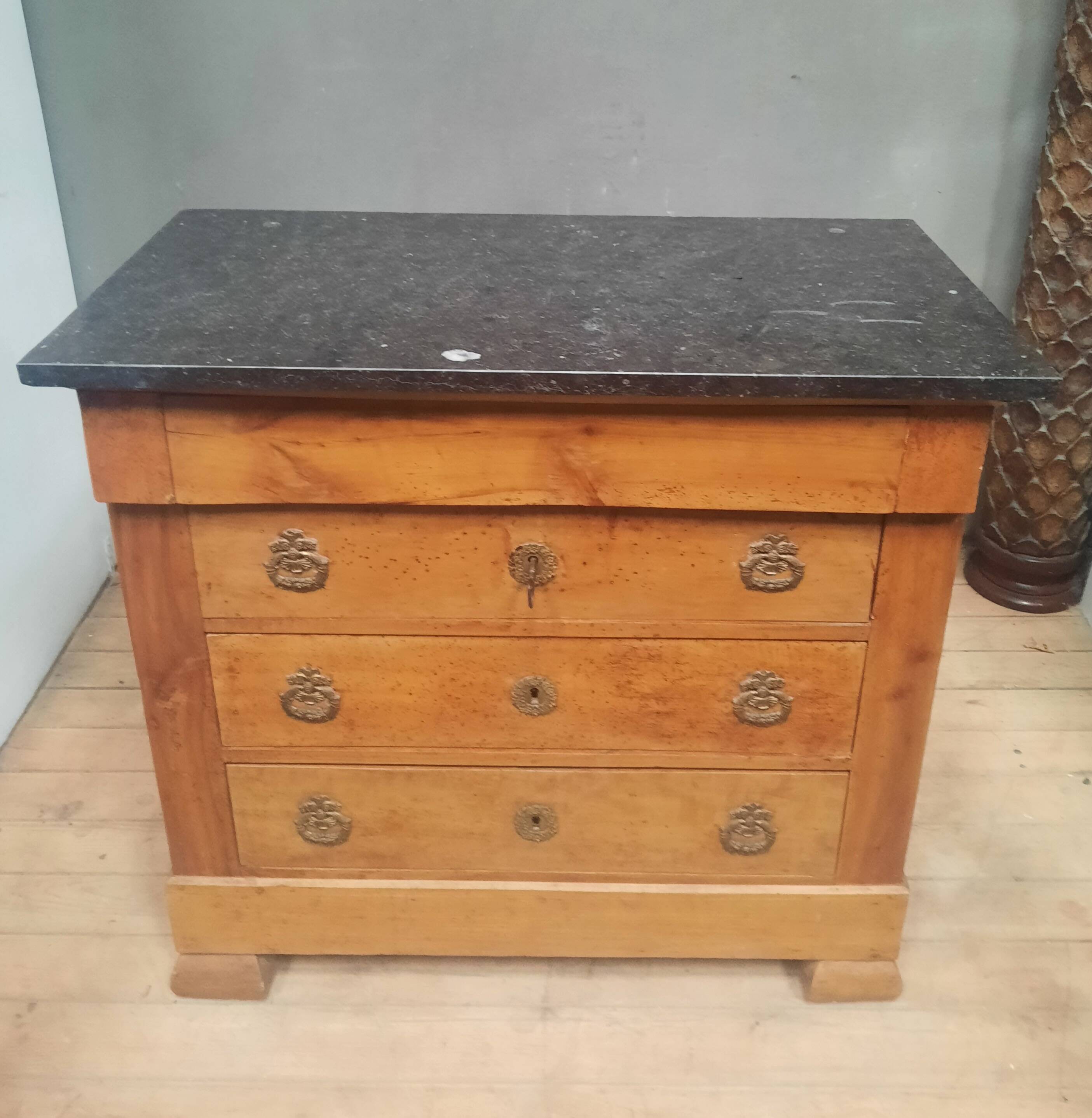 Nineteenth-century commode with marble top.