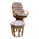 Swivel rattan armchair with matching ottoman
