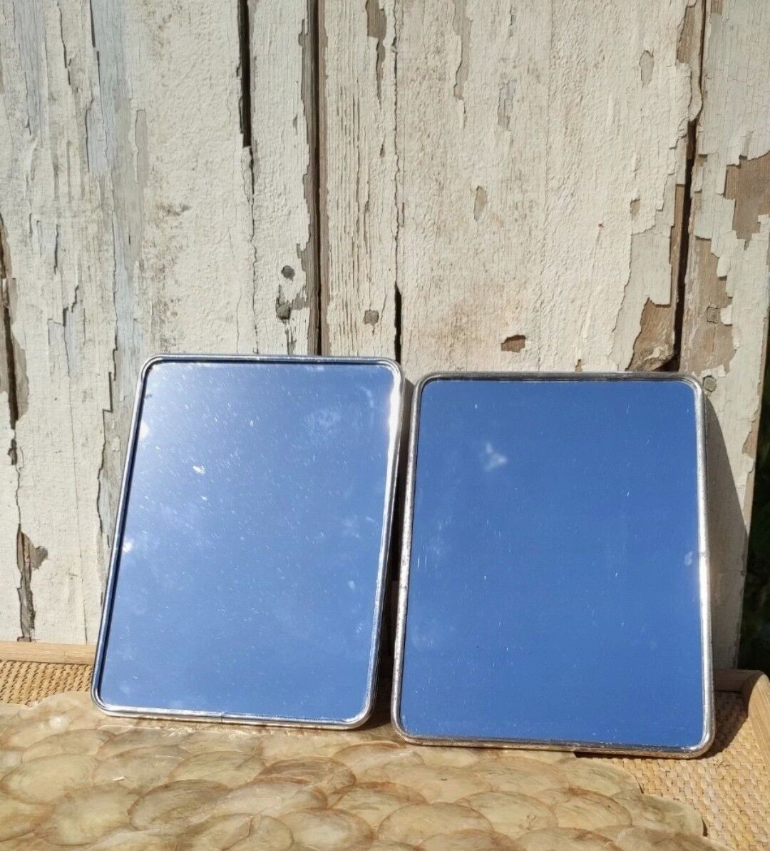 Duo of barber mirrors to pose