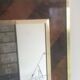 Miroir en marqueterie de bois et laiton