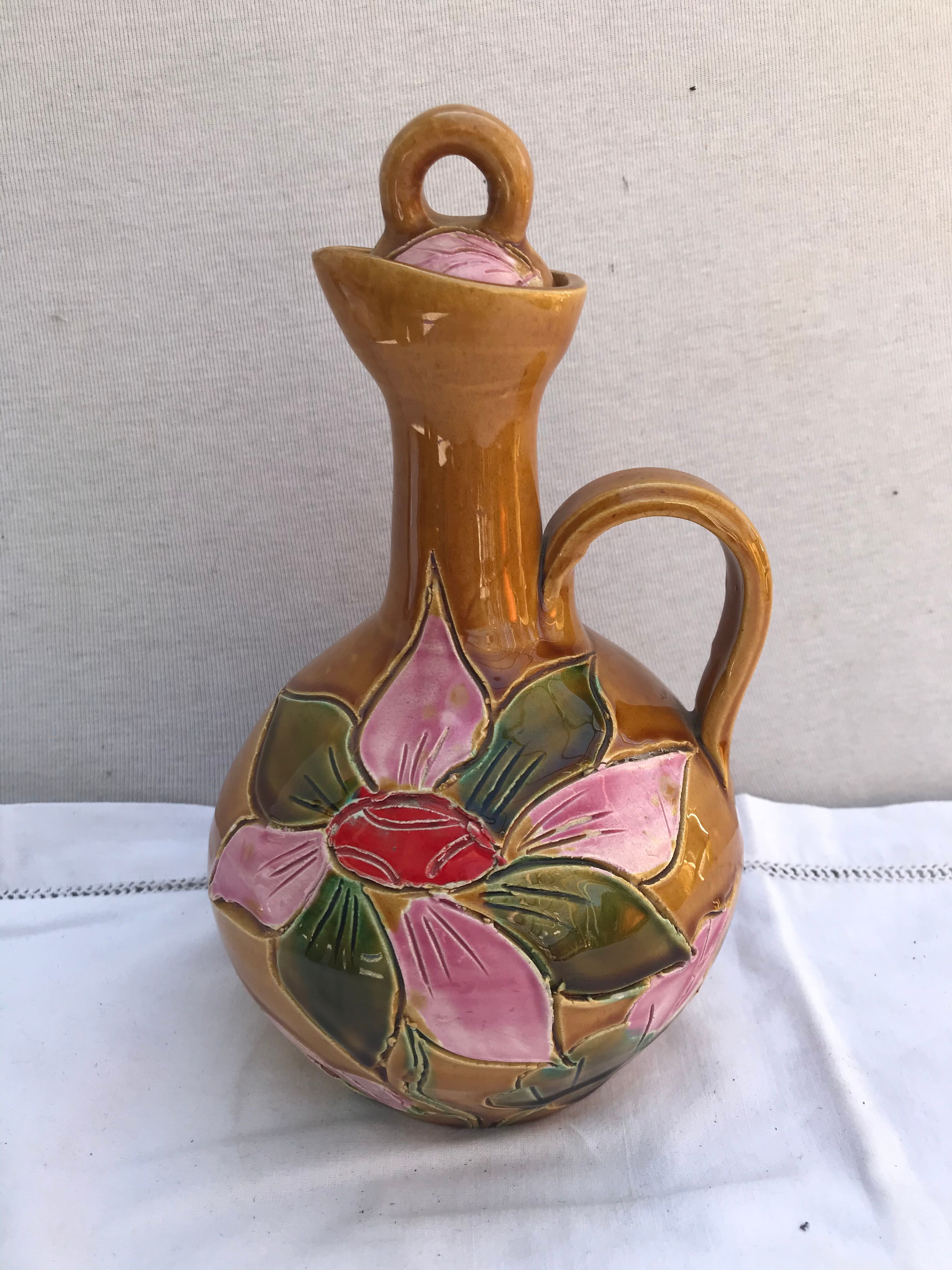 Old carafe with 8 ceramic glasses