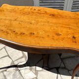 Solid wood table with curved legs