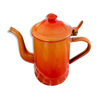 Old red enameled coffee pot