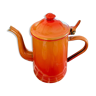 Old red enameled coffee pot