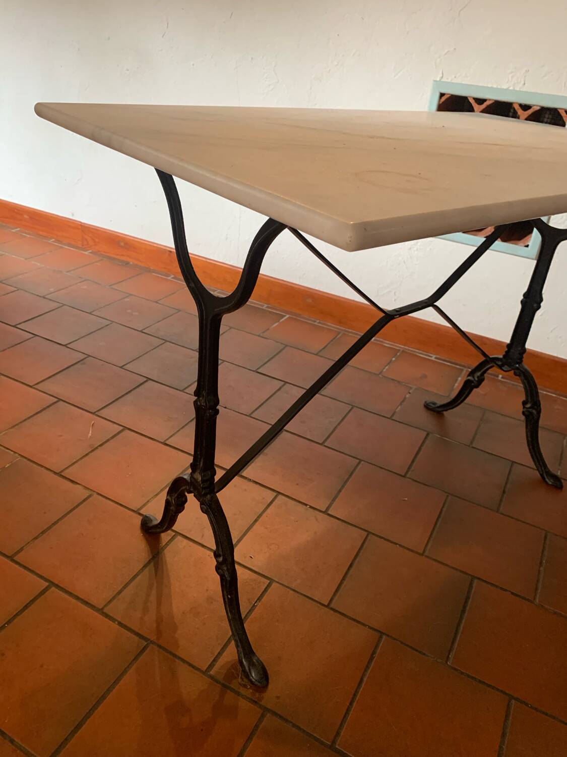 Marble and wrought iron bistro table