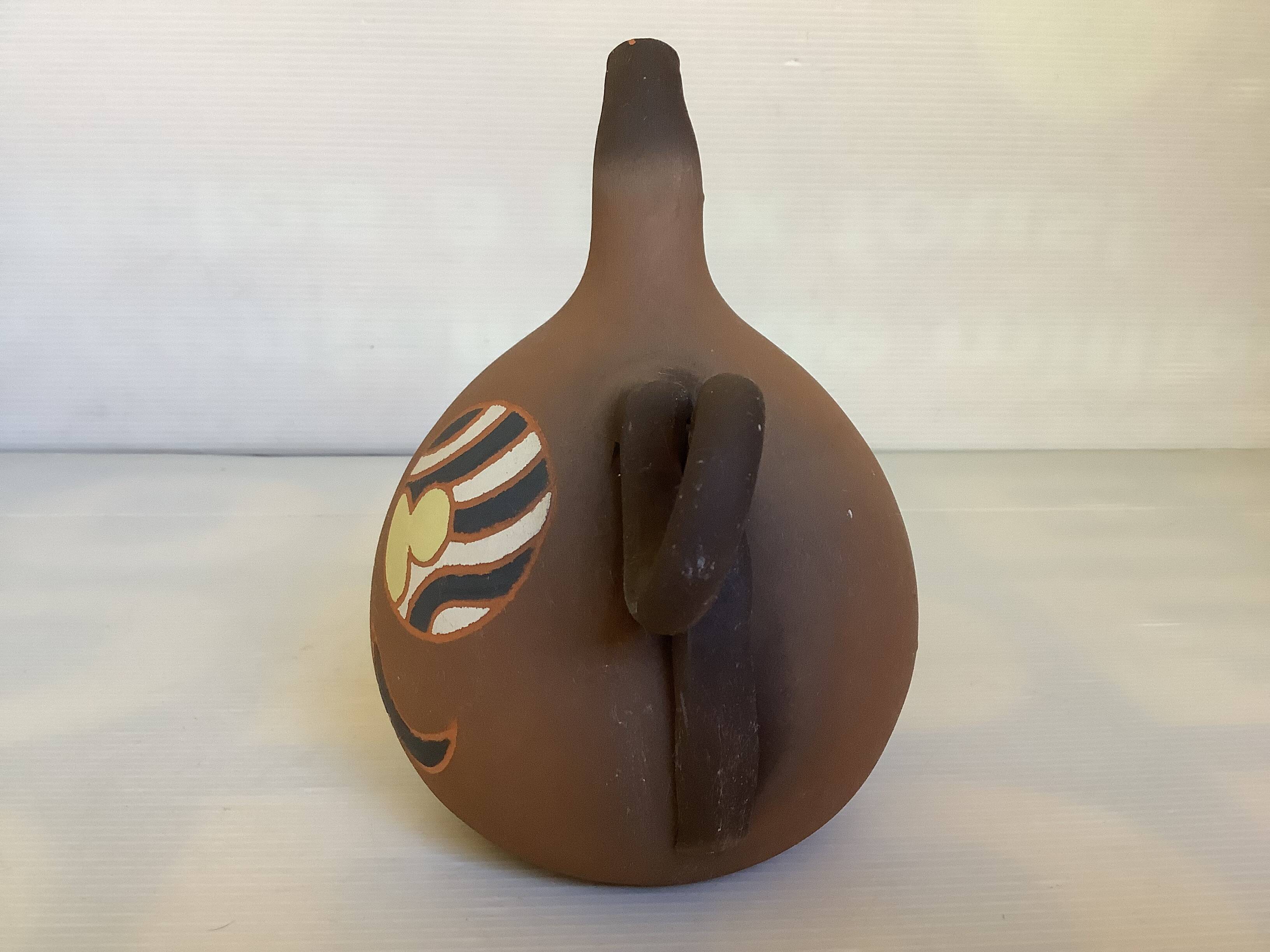 Signed terracotta vase