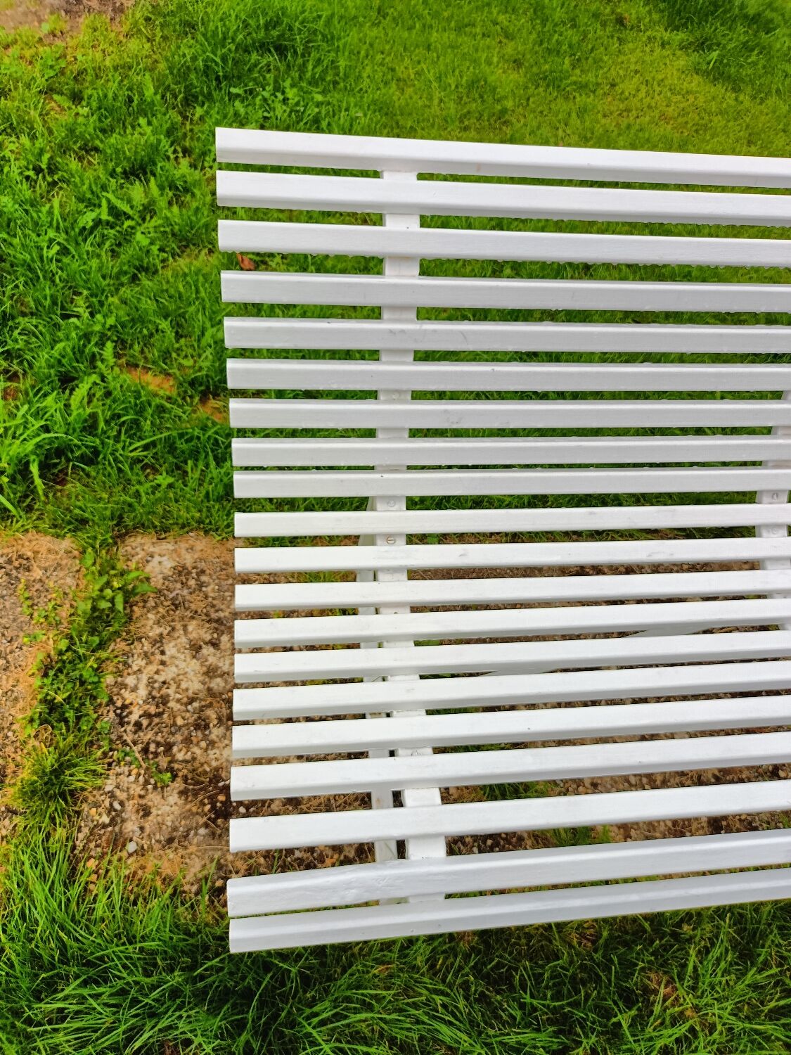 Antique garden bench with metal legs