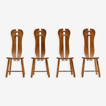 Set of 4 brutalist oak dining chairs made by Kunstmeubelen de Puydt, Belgium 70s.