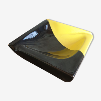 Yellow and black ashtray