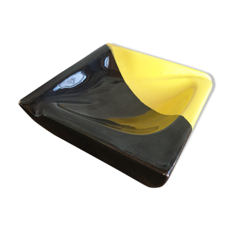 Yellow and black ashtray