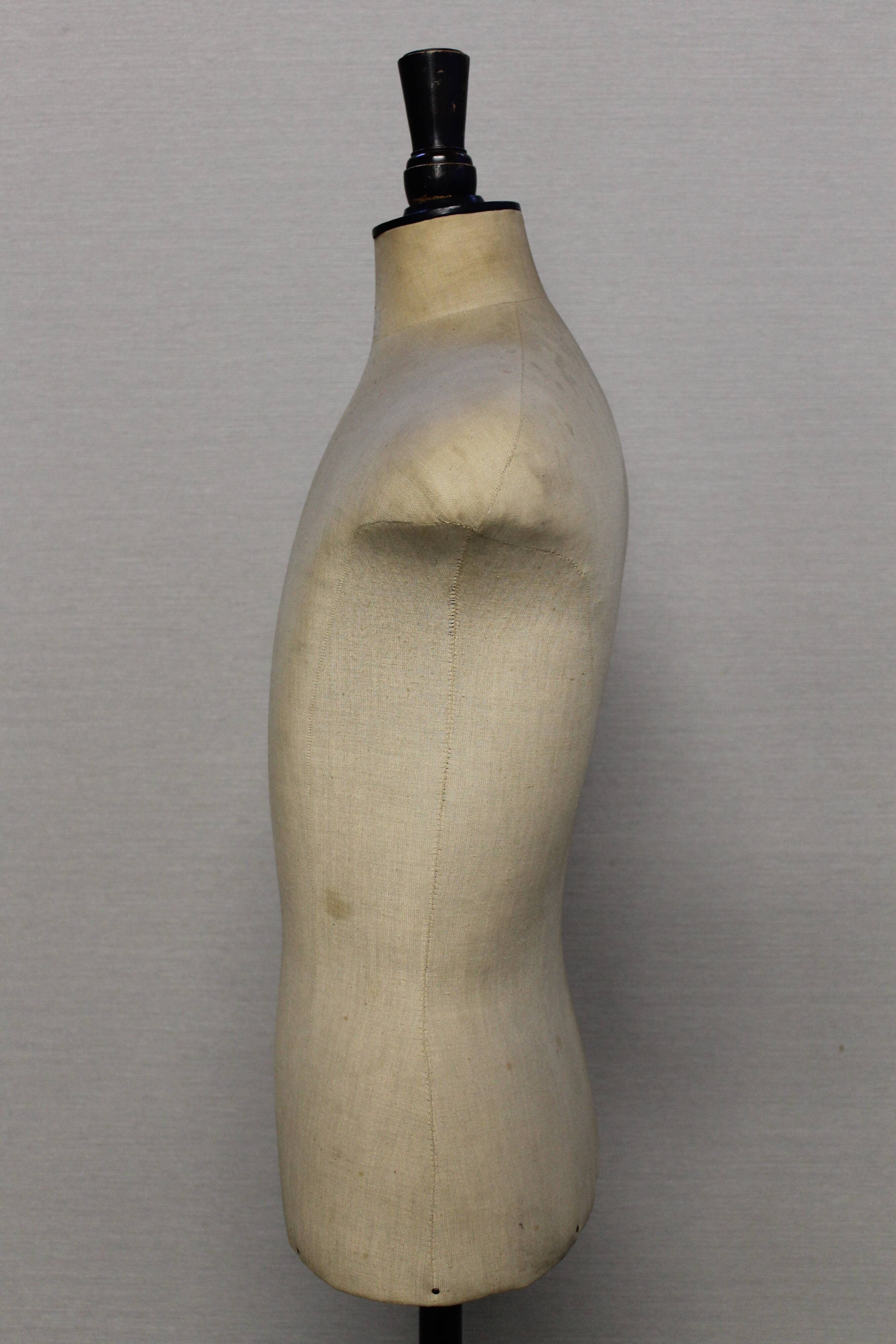 Man sewing mannequin