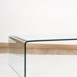 Transparent tempered glass coffee table.