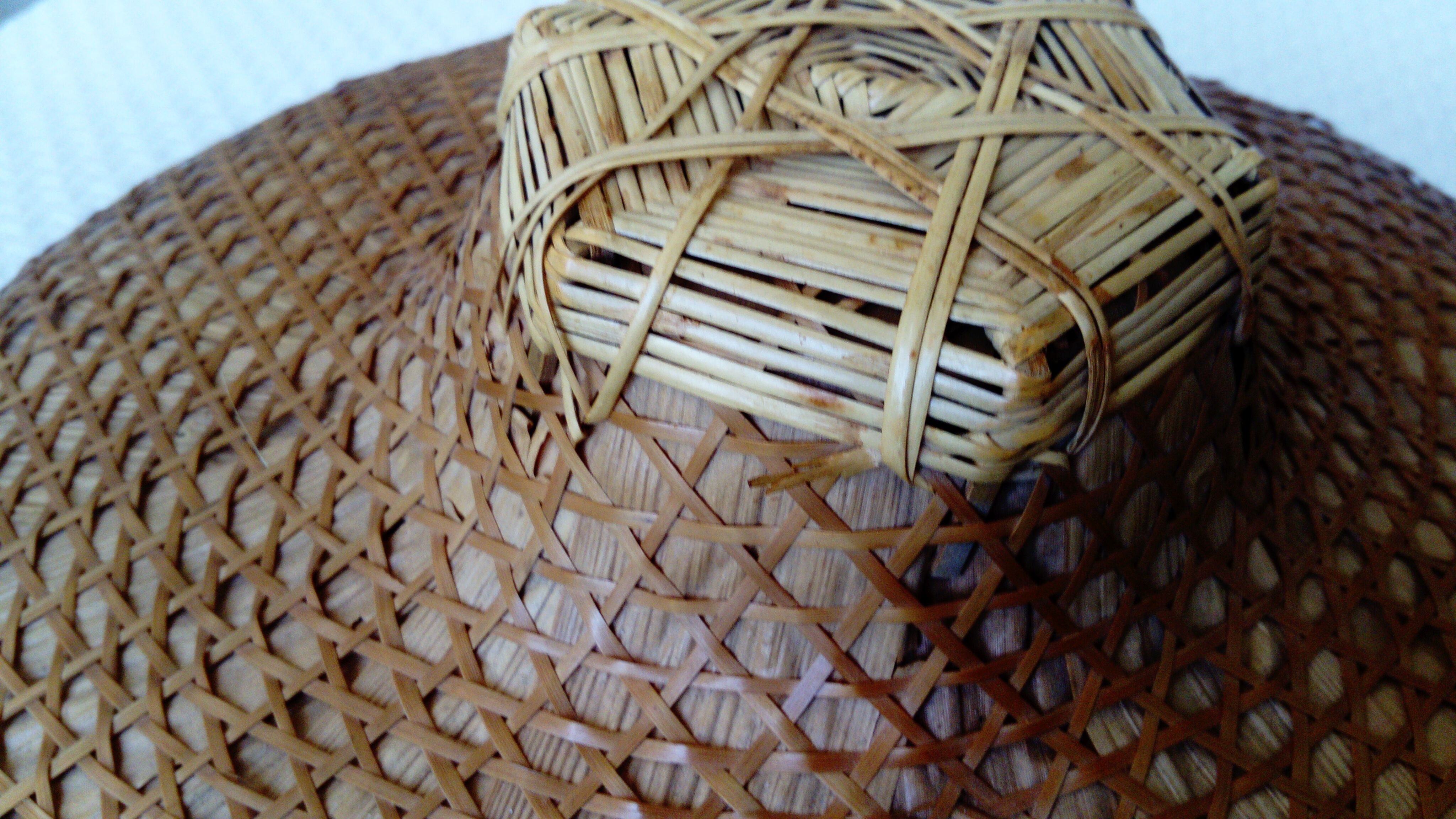 Asian hat braided.