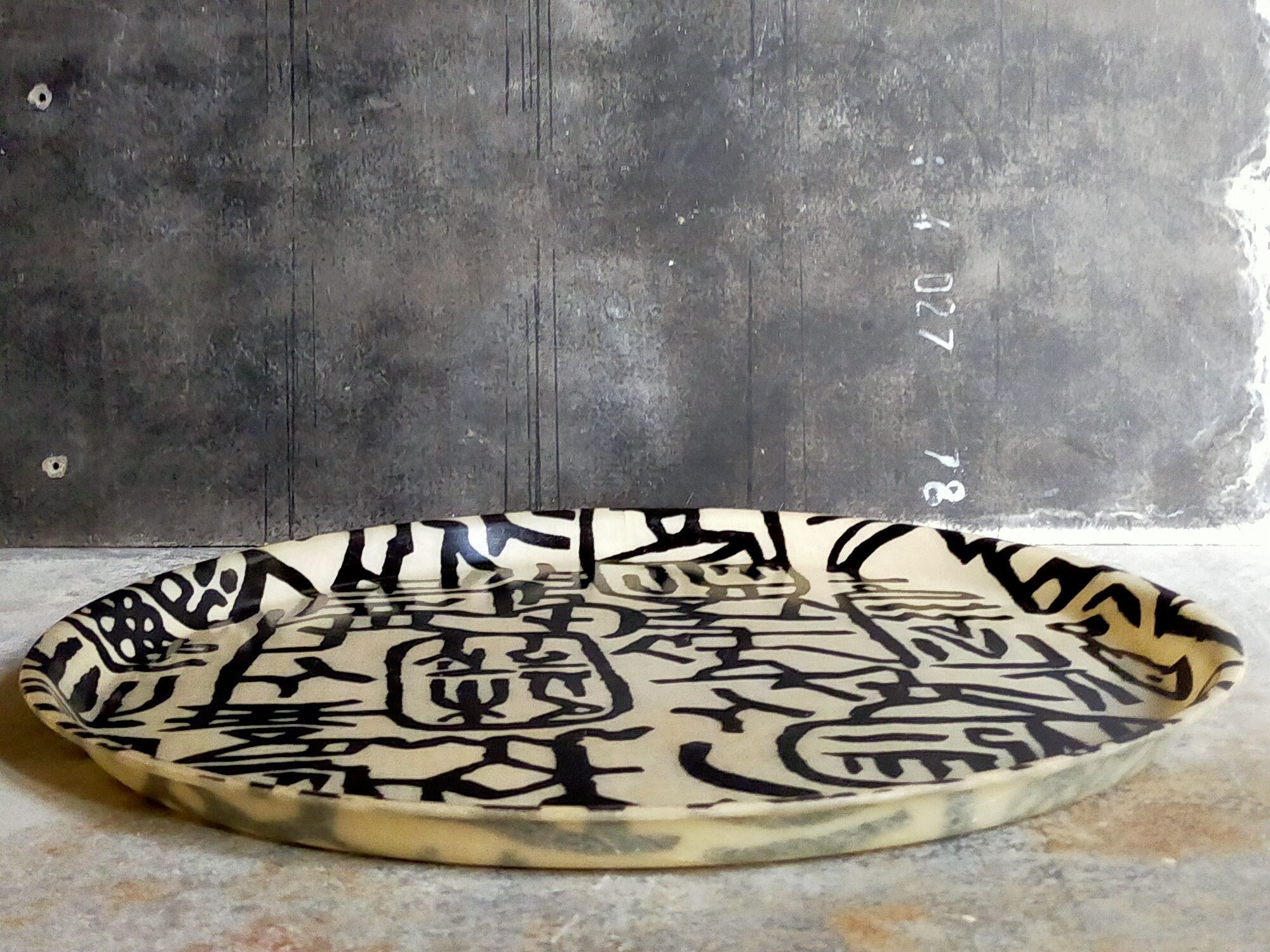 Vintage fiberglass tray with graphic patterns