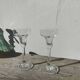 Pair of clear glass candlesticks, signed