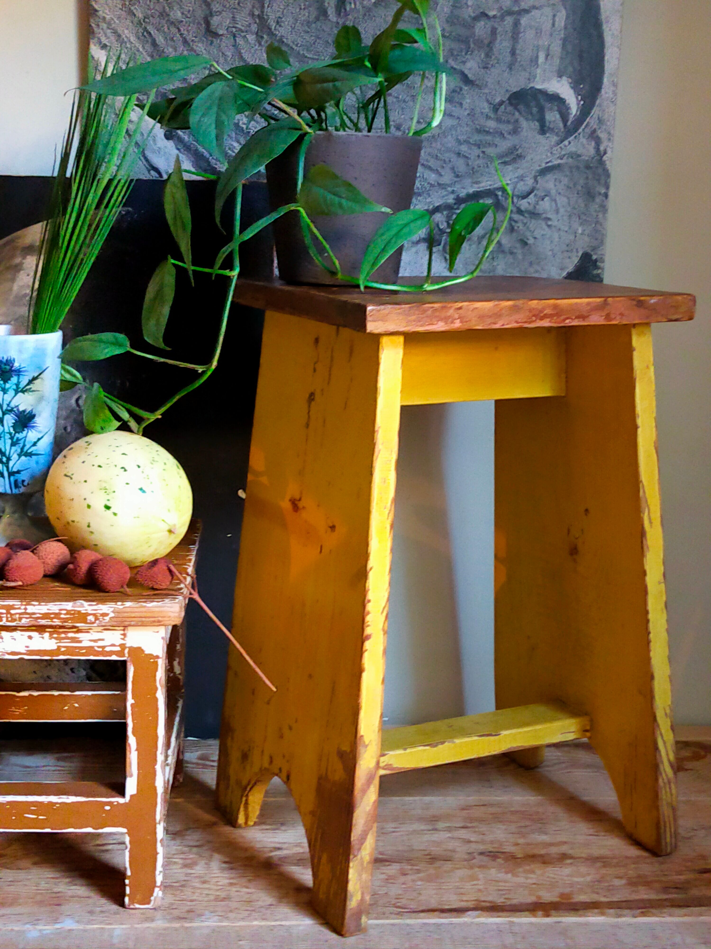 Art-populaire workshop stool in patinated wood