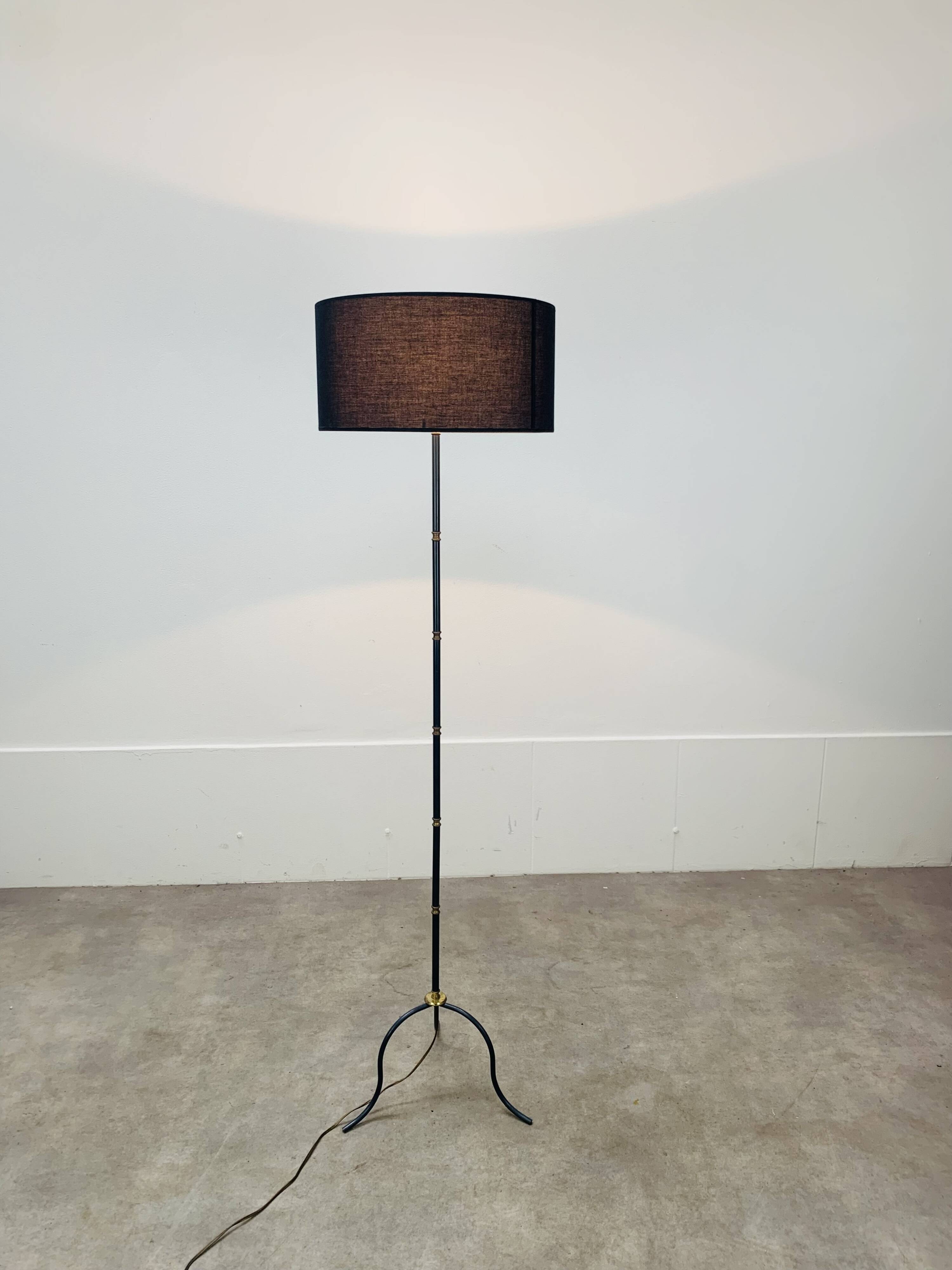 1950s tripod floor lamp, brass and black metal