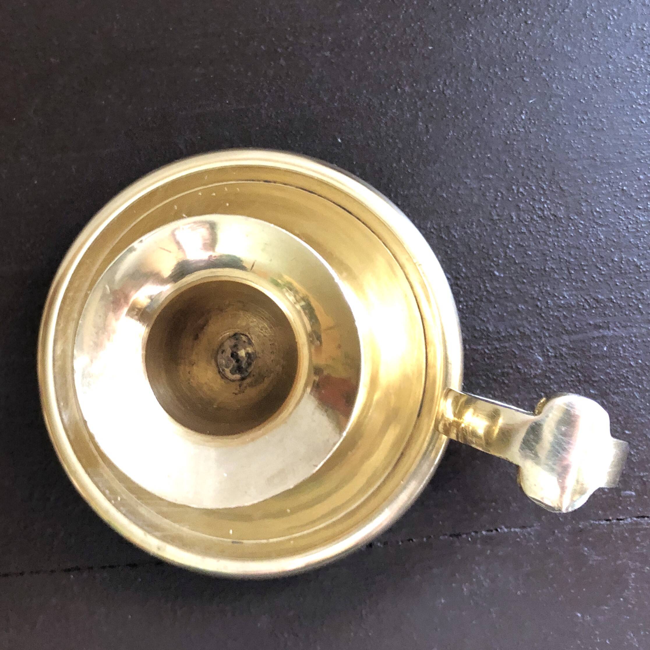 Hand candle holder called "Cave Rat" vintage golden brass