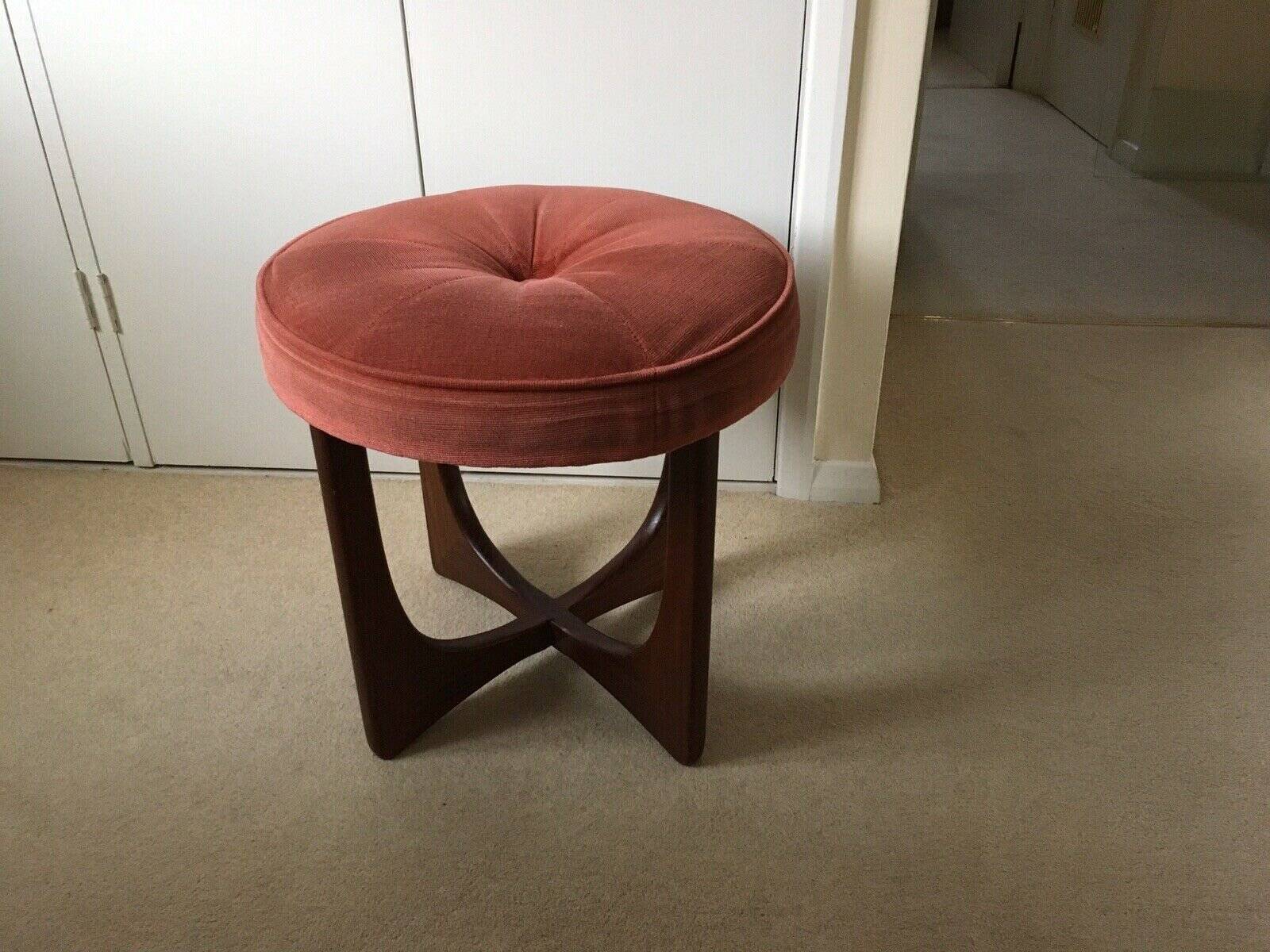 Mid-century ottoman in teak and salmon pink fabric - sculptural stool by G-Plan from the 1960s.