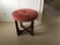 Mid-century ottoman in teak and salmon pink fabric - sculptural stool by G-Plan from the 1960s.