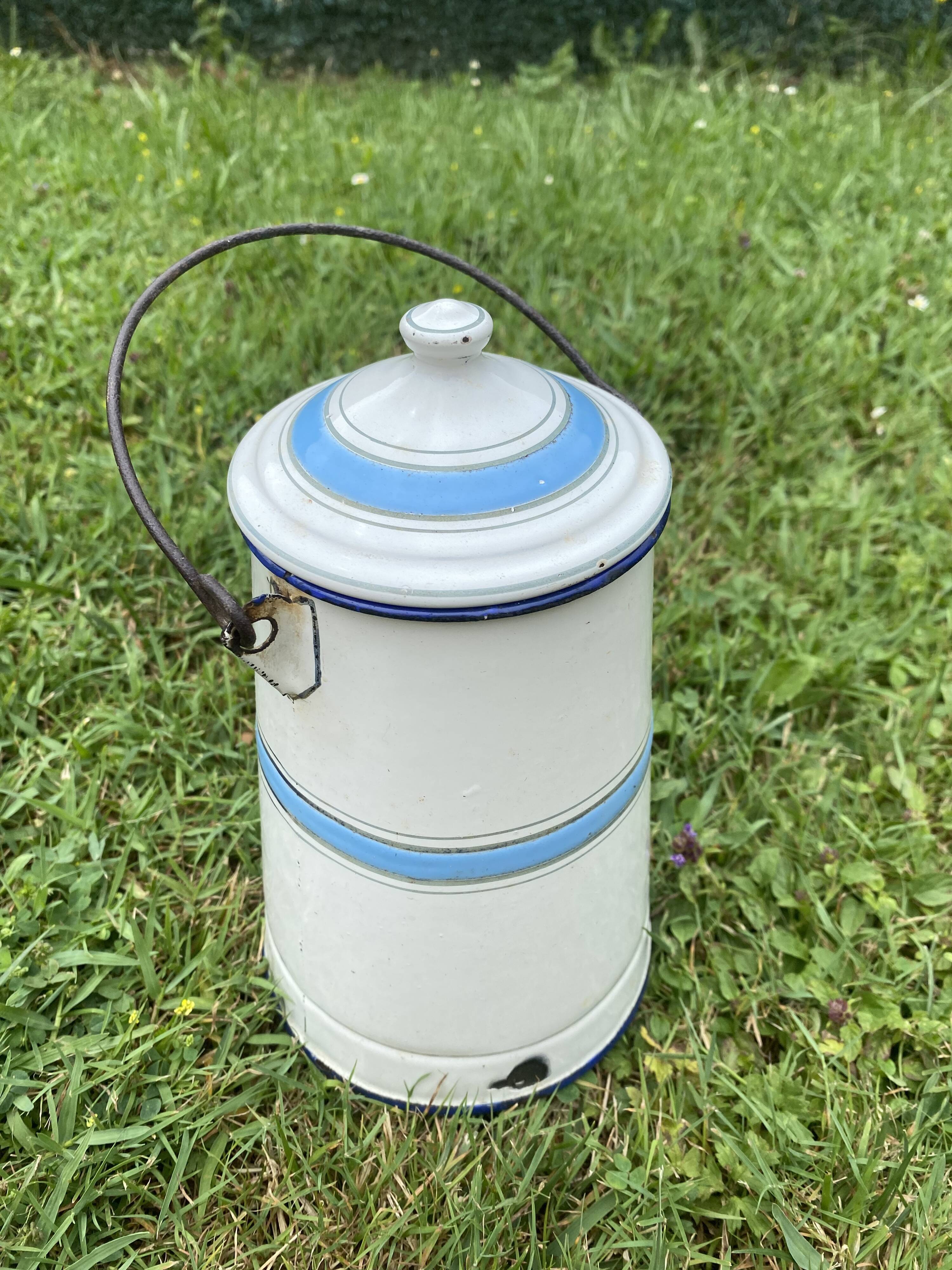 Old milk pot in enamelled sheet metal
