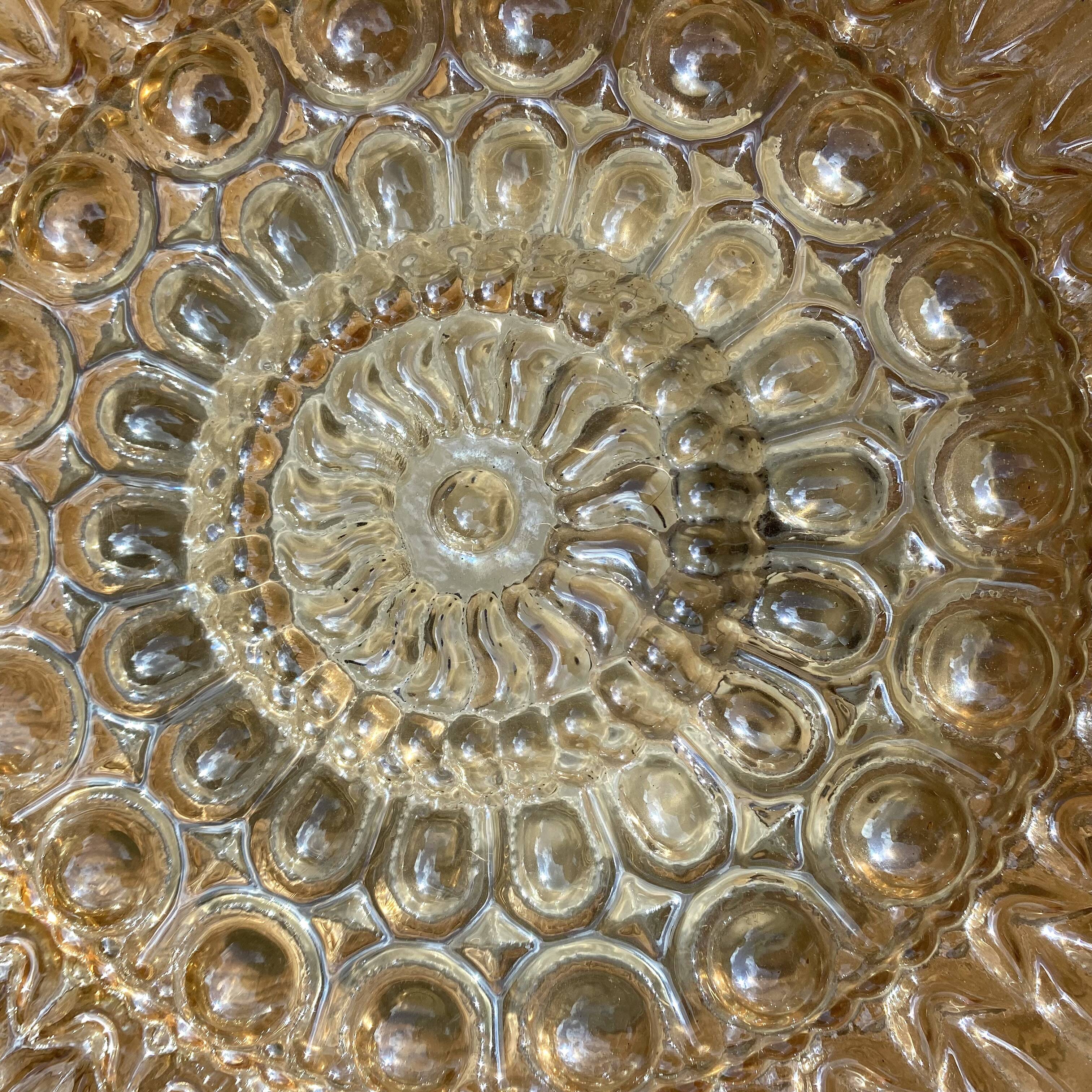 Vintage round ceiling light in amber glass
