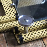 1950s perforated metal coat holder