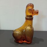 Flacon ancien en verre ambré "caniche"