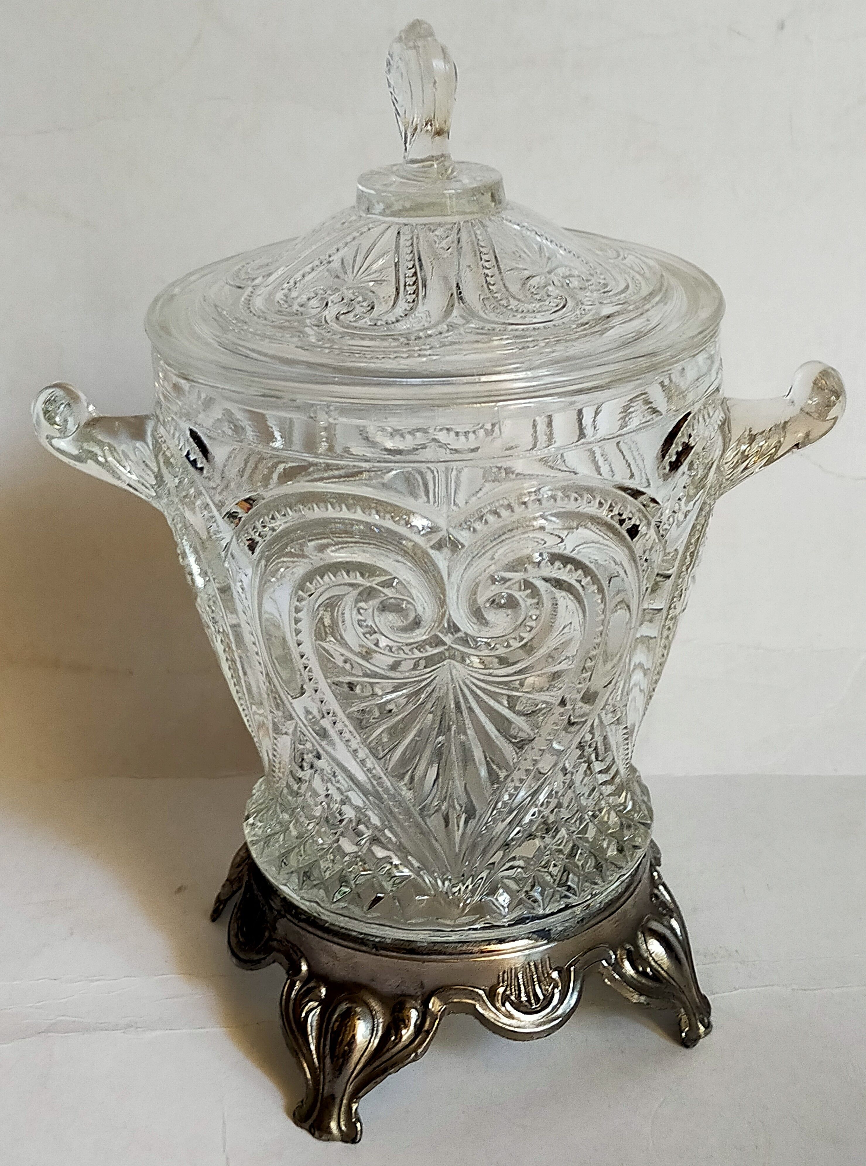 Antique glass compotier on metal stand