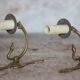Pair of Empire style bronze wall lights, bronze wall light with palmette and swan neck.