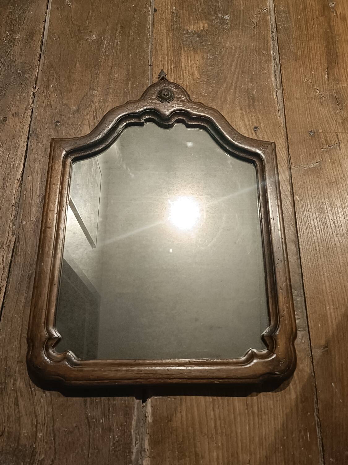 Antique shaped mirror, wood and bronze
