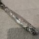 Silver-plated metal leg of lamb handle in art nouveau style