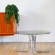 Round coffee table in smoked glass and chrome, star base, design, 1970.