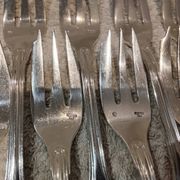 12 silver-plated metal cake forks by Argental silversmiths with a decorative pattern
