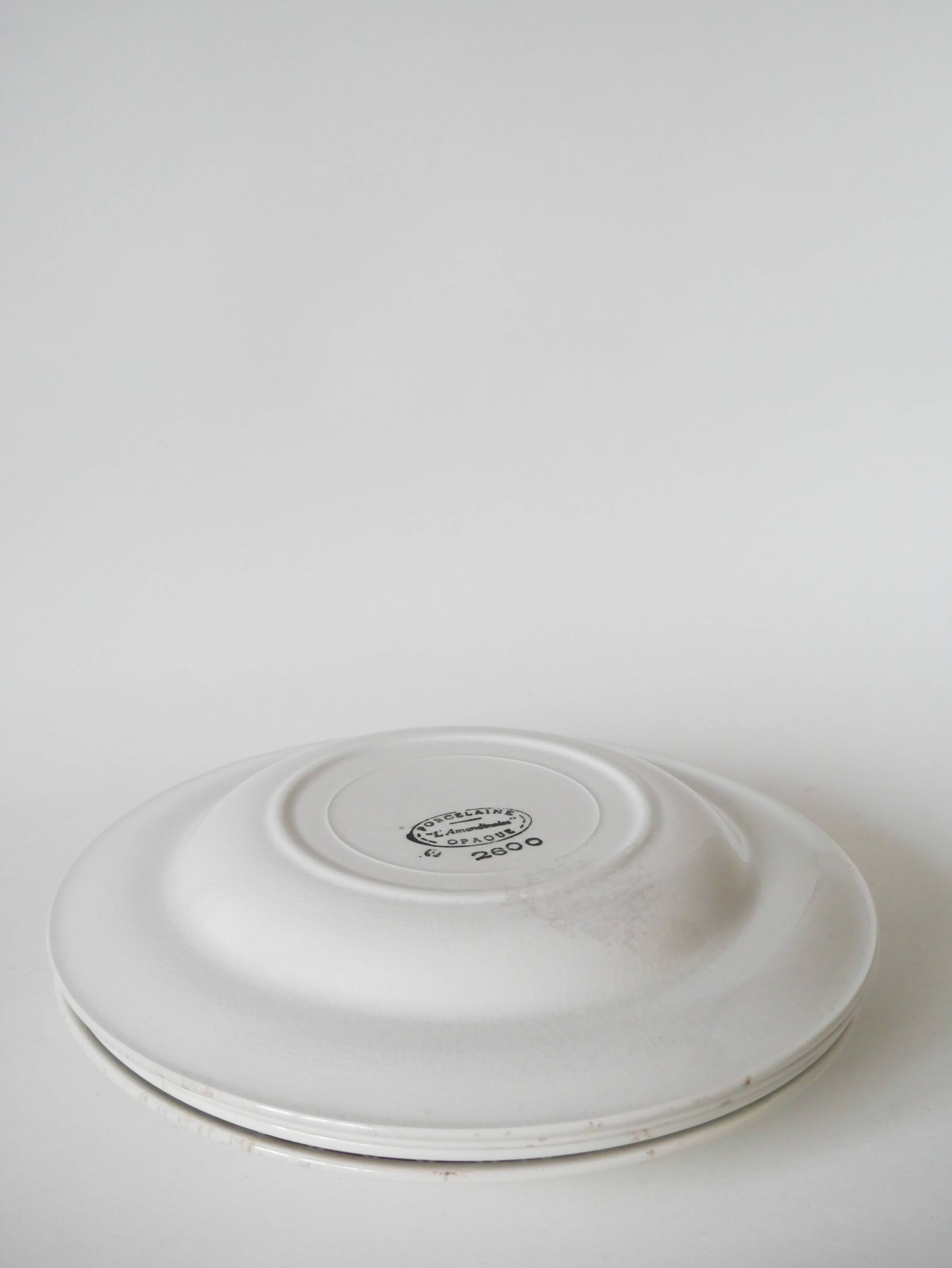 Set of 4 Saint Amand soup plates with burgundy flower outlines 1950