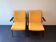 2 yellow 'Oase' lounge chairs with armrests by Wim Rietveld for Ahrend de Circel