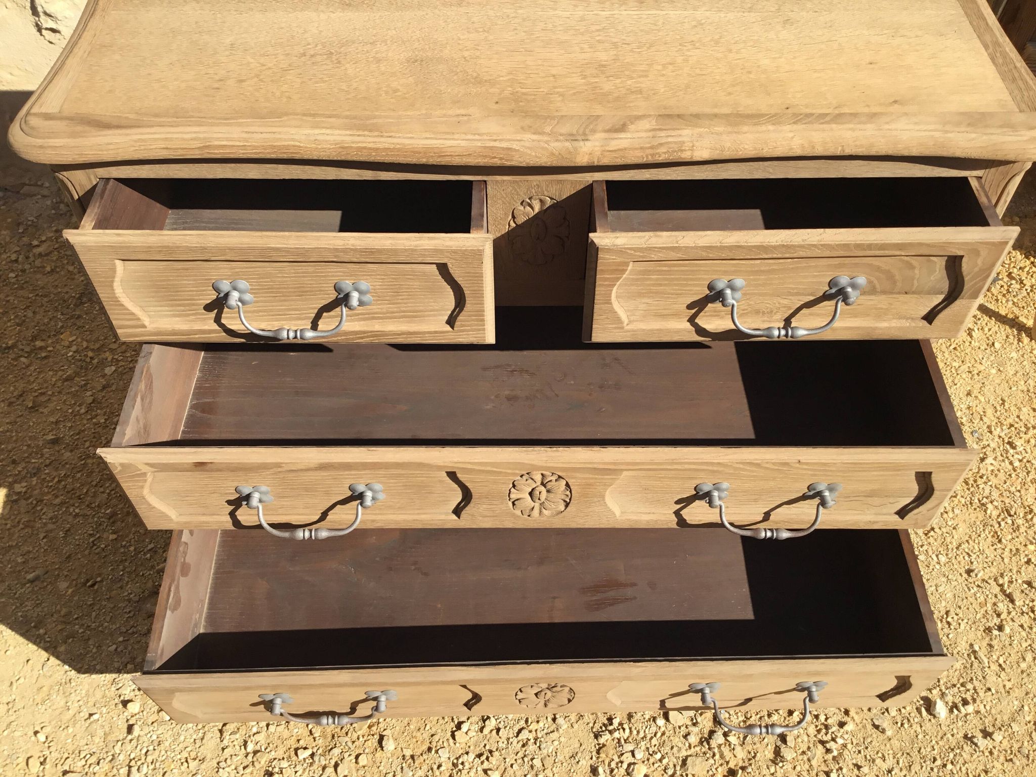 Louis XV style chest of drawers in stripped oak and left in natural wood