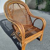 Vintage rattan armchair Mélarti (Emmanuelle style) + custom cushion