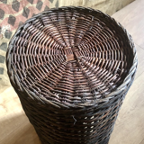 High basket in braided wicker
