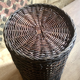 High basket in braided wicker