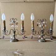 Pair of girandole lamps and silver metal