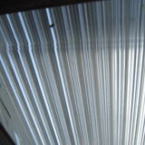 Vestiaire wears hat coat and art deco umbrella in wrought iron patere wood