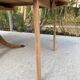 Extendable round dining table with central leg renovated in raw wood 205cm