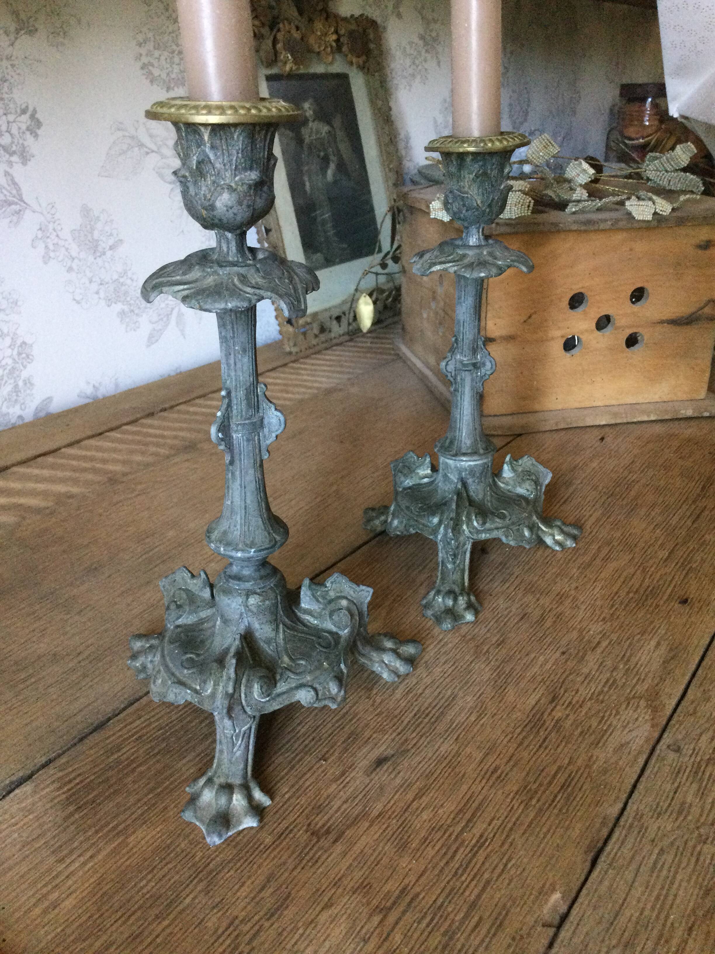 Set of 2 antique candlesticks in spelter.
