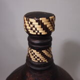 Old bottle in leather