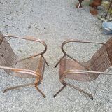Pair of perforated metal armchairs by René Malaval 1950